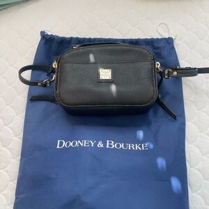 Dooney & Bourke small bag. Includes dust bag.
